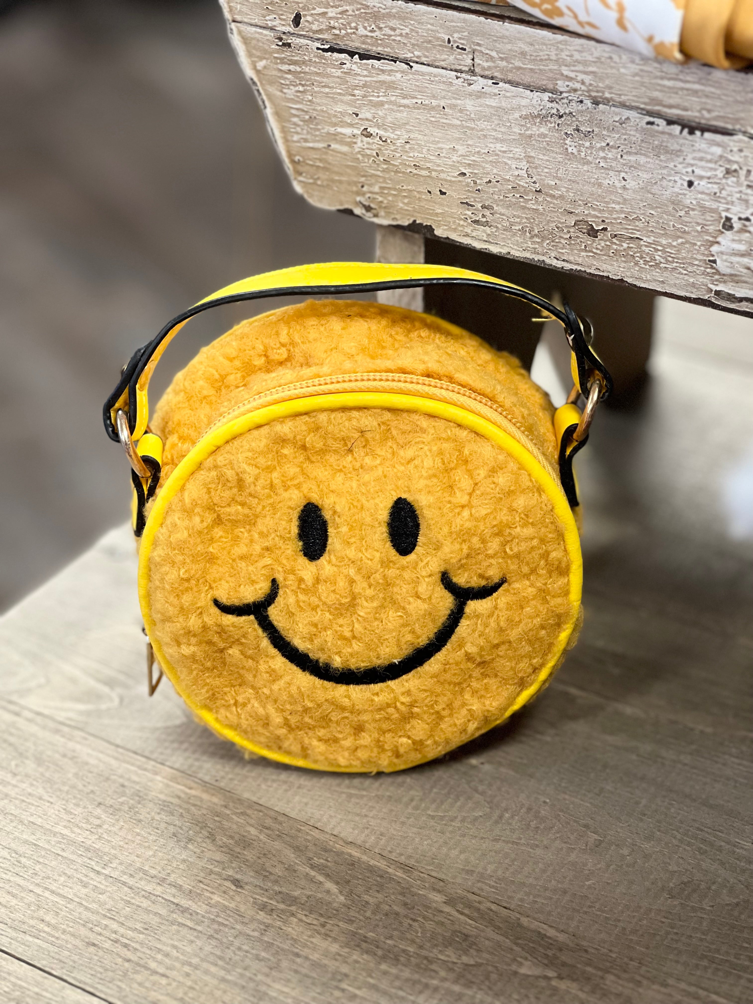 Premium Photo | A yellow wallet with eyes and a smiley face on it.